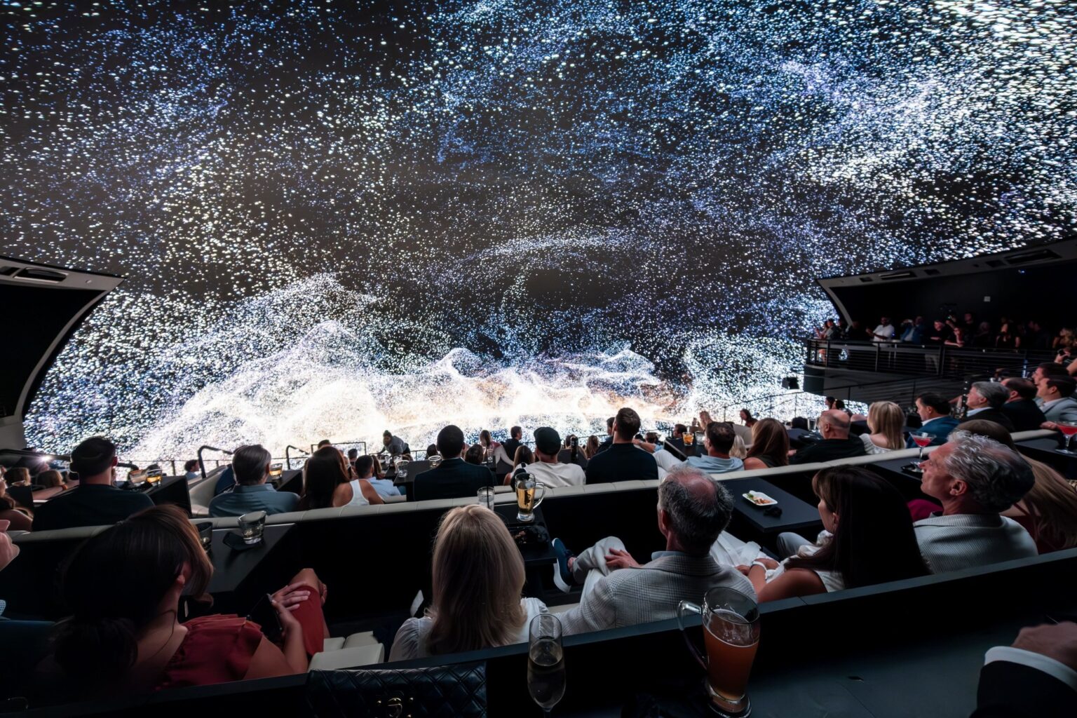 Photo of the inside of Cosm, the event venue.